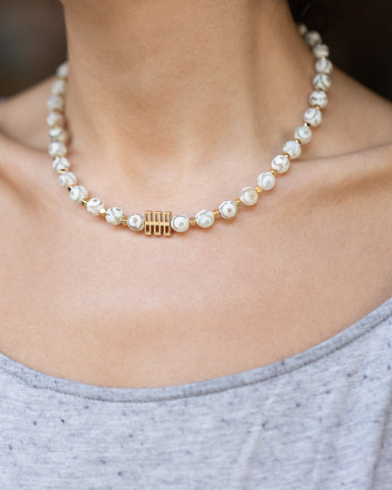White Eye Necklace