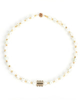 White Eye Necklace